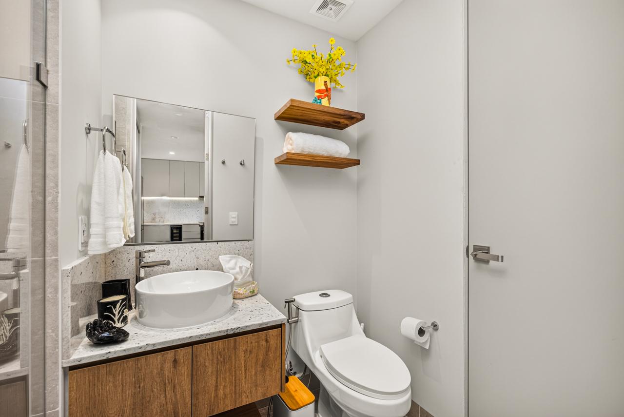 Second bathroom at Casa Nayah with vessel sink and terrazzo counter