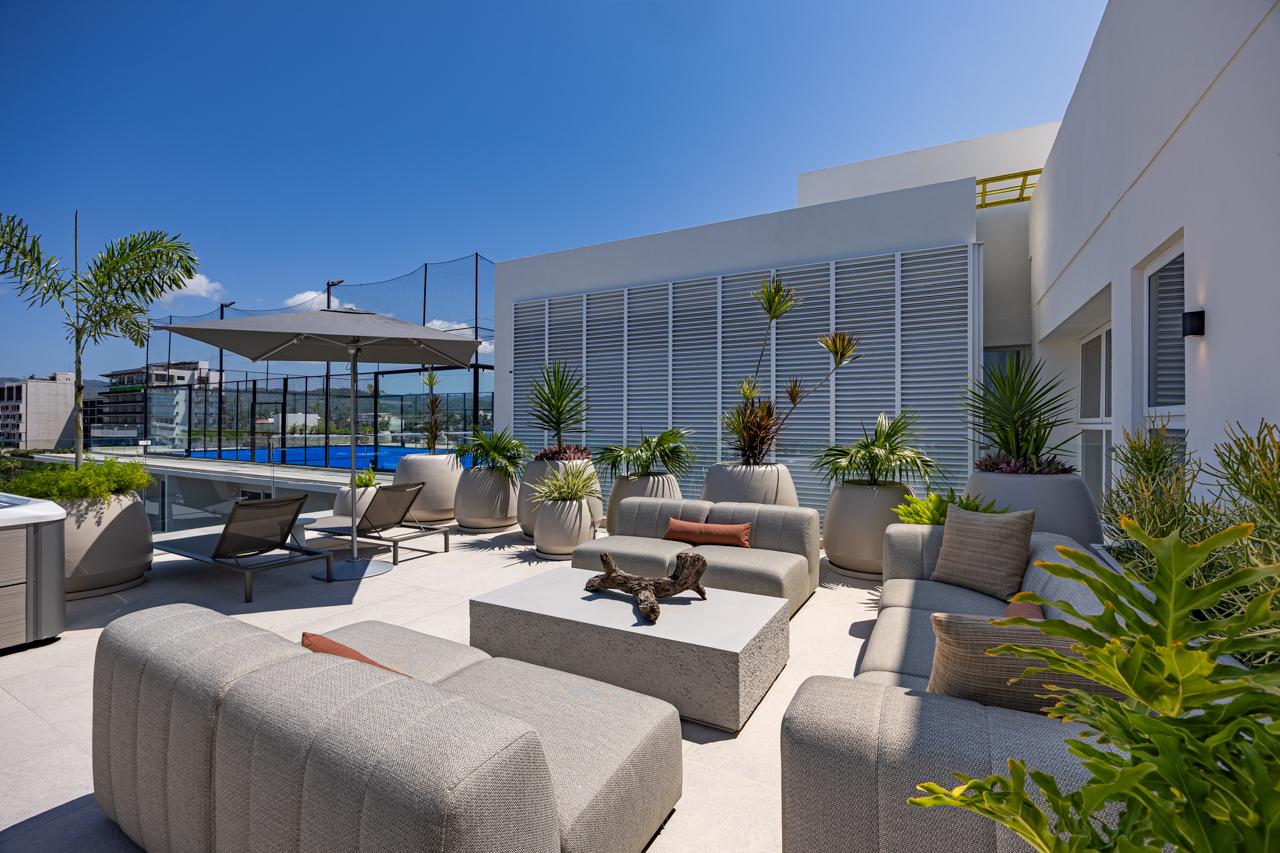 Rooftop lounge beside the pickleball court