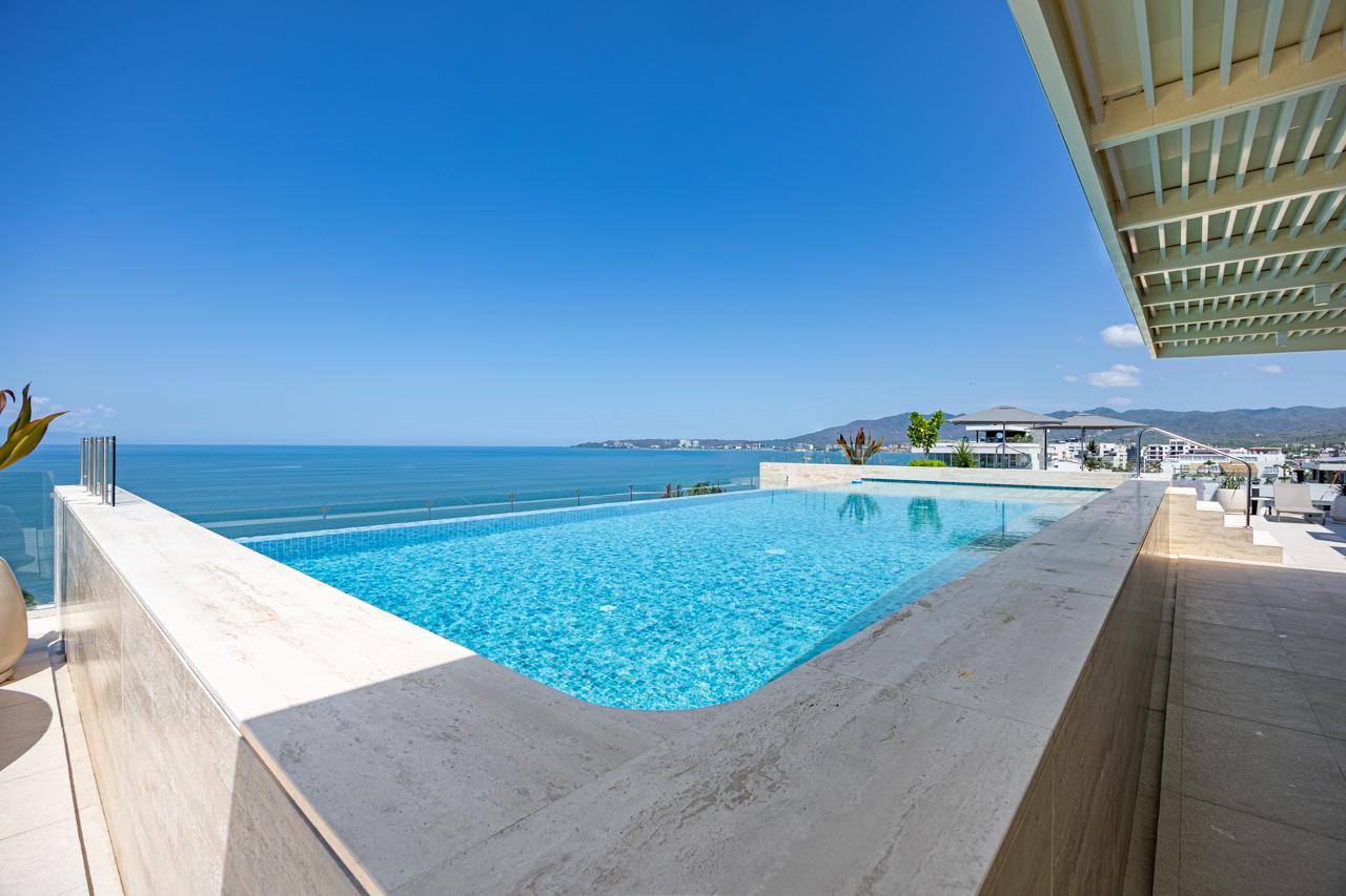 Rooftop infinity pool at Casa Nayah with sweeping views of Banderas Bay